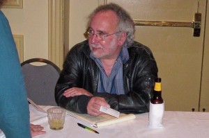 Peter S. Beagle, signing books at the World Fantasy Convention in Texas, 2006.