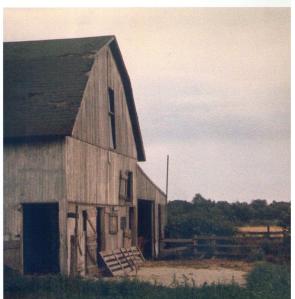 My barn: this photo was taken by my Cousin Steve either when I was a baby or before I was born; the barn as seen here is in slightly better shape than it was during most of our "glory days."